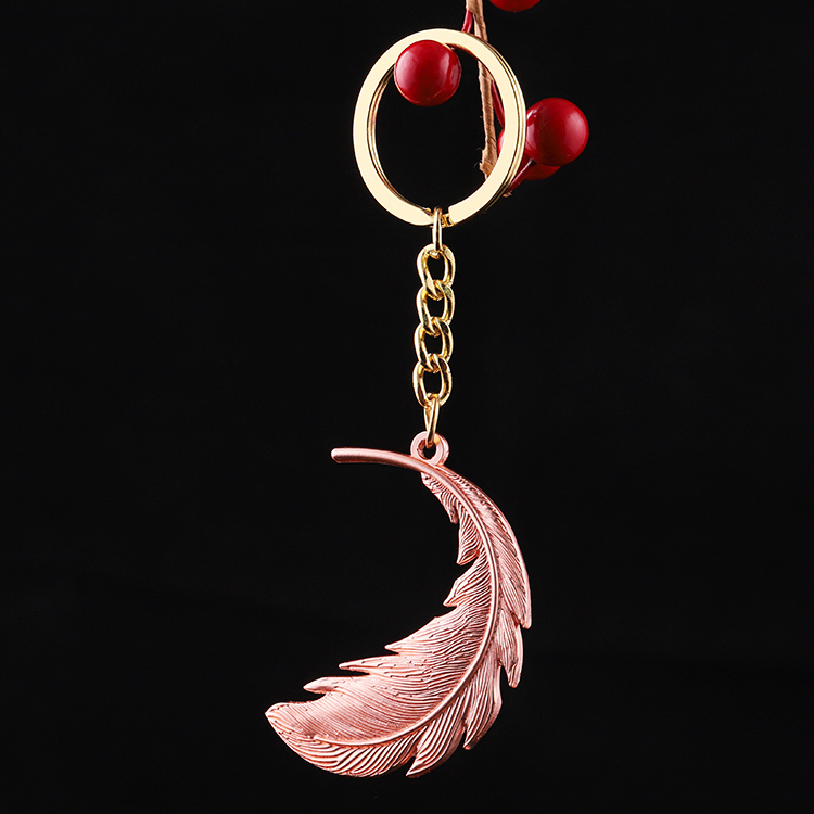 Wholesale Feather Beauty Shape Custom Cast Metal Keychains for Girls